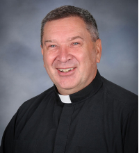 Father Neal Clemens\t