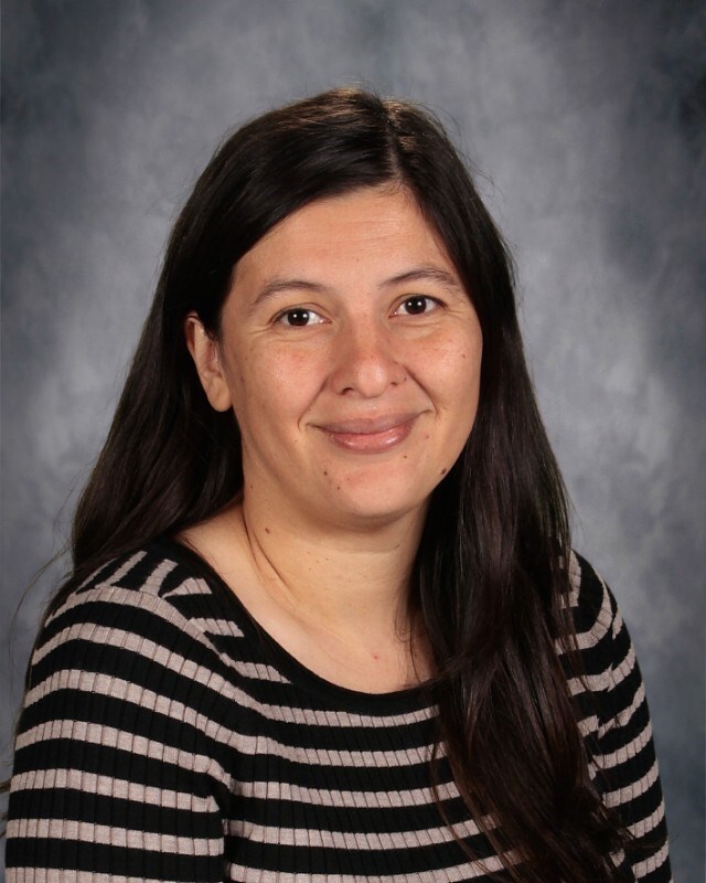 Mrs. Minerva Corona