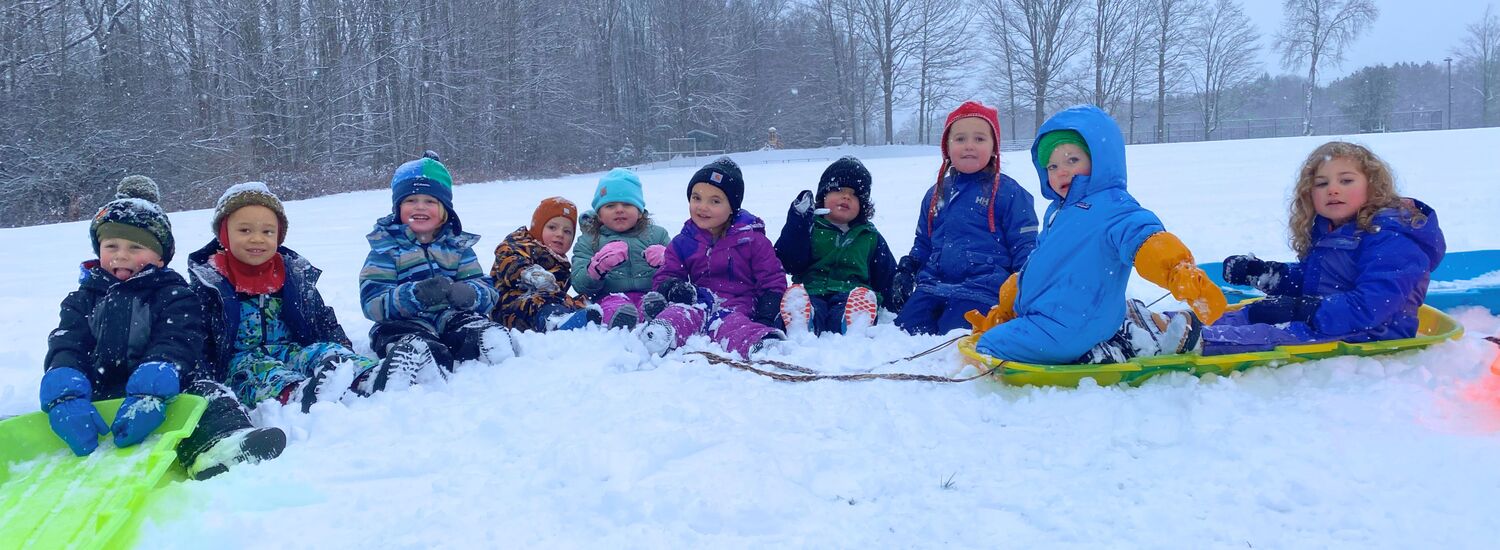 Six - sledding image for Aurora Waldorf School