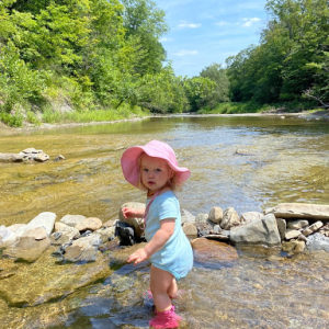 A second generation enjoys the creek behind AWS