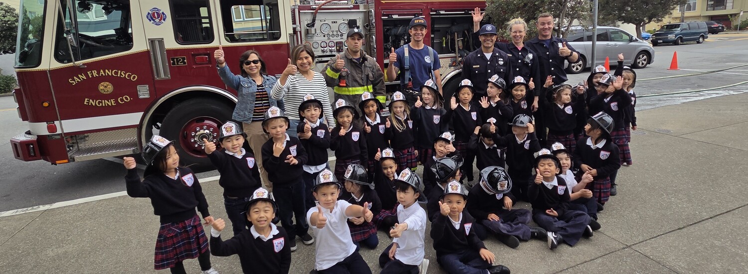 Kindergarteners with Fire Truck image for Holy Name School
