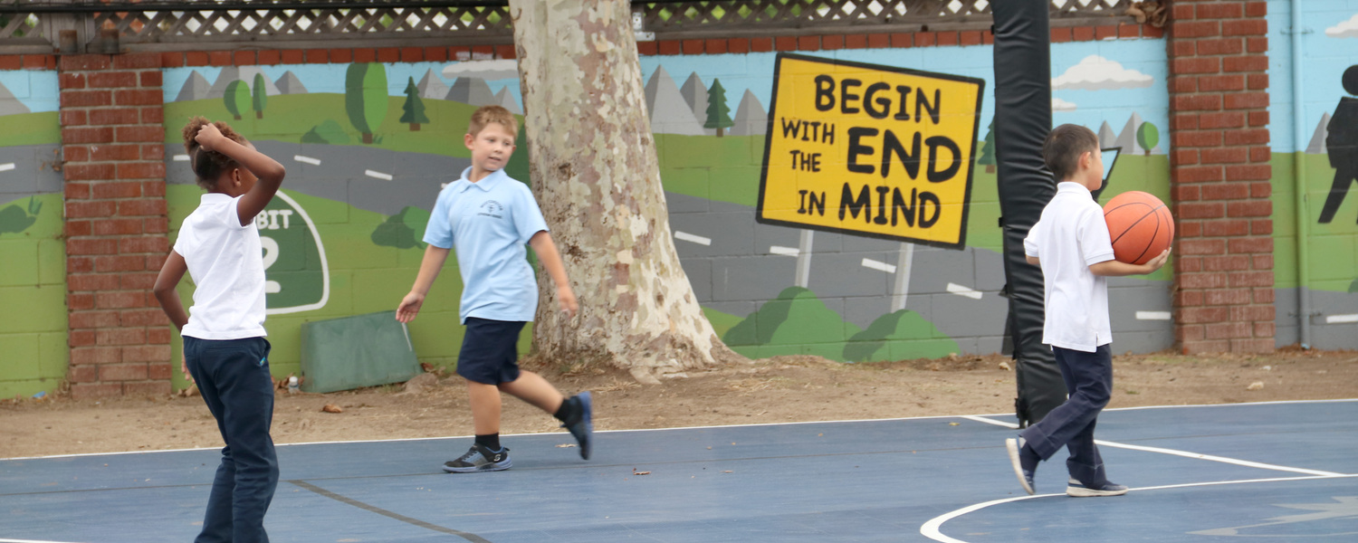 Kids in the basketball court image for Westchester Lutheran
	              School