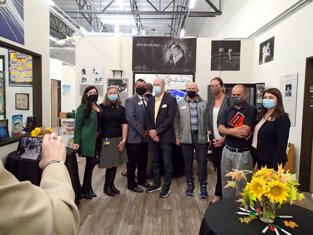 Invited dignitaries take a group photo with Assemblymember Jacqui Irwin (third from right).